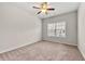 Bright bedroom with a large window and neutral carpeting at 2474 Norwood Park Xing, Atlanta, GA 30340