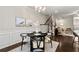 Elegant dining room featuring stylish decor, chandelier, and hardwood floors at 2474 Norwood Park Xing, Atlanta, GA 30340
