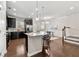 Modern kitchen featuring dark cabinetry, granite countertops, and stainless steel appliances at 2474 Norwood Park Xing, Atlanta, GA 30340
