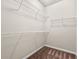 Functional walk-in closet with wire shelving for organized storage at 2474 Norwood Park Xing, Atlanta, GA 30340