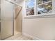 Bathroom featuring walk-in shower with glass door and bright window at 930 Camden Hill Ct, Lawrenceville, GA 30046