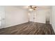 Large bedroom with hardwood floors, neutral walls, ensuite bathroom, and walk-in closet at 930 Camden Hill Ct, Lawrenceville, GA 30046