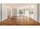 Bright and open living room featuring hardwood floors and large windows at 930 Camden Hill Ct, Lawrenceville, GA 30046