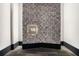 Hallway featuring unit number 16 with a modern accent wall at 943 Peachtree Ne St # 1603, Atlanta, GA 30309
