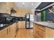 Beautiful kitchen featuring stainless steel appliances, an island with countertop seating, and ample cabinet space at 943 Peachtree Ne St # 1603, Atlanta, GA 30309