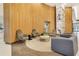 Lobby features a seating area with decorative wood panels and designer furniture at 943 Peachtree Ne St # 1603, Atlanta, GA 30309
