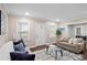 Inviting living room with hardwood floors, neutral tones, and plenty of natural light at 1013 Columbia Dr, Decatur, GA 30030