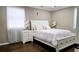 Bedroom featuring a bed, hardwood floors, and bright natural light from the window at 187 Bowden Rd, Ellenwood, GA 30294