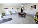 Bright dining area features neutral tile flooring, decoratives and brick accents at 187 Bowden Rd, Ellenwood, GA 30294