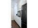 Modern kitchen with sleek appliances, granite countertops, and ample storage solutions at 187 Bowden Rd, Ellenwood, GA 30294