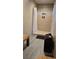 The shower area features tiled walls, tiled floors, shower head, and storage at 187 Bowden Rd, Ellenwood, GA 30294