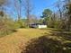 The backyard shows a serene setting at 2403 Dawn Dr, Decatur, GA 30032