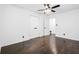 Empty room with hardwood floors, double closets, and a ceiling fan at 2403 Dawn Dr, Decatur, GA 30032