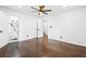 Spacious bedroom with hardwood floors, ceiling fan and ensuite bathroom at 2403 Dawn Dr, Decatur, GA 30032