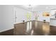 Spacious living room featuring dark hardwood floors and multiple entrances at 2403 Dawn Dr, Decatur, GA 30032