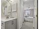 A well-lit bathroom leads to the bedroom, complete with a mirror and storage vanity at 300 Johnson Ferry Ne Rd # A313, Atlanta, GA 30328