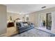 Cozy bedroom featuring a sitting area, balcony access, and a soft, neutral color palette at 300 Johnson Ferry Ne Rd # A313, Atlanta, GA 30328