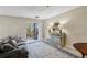 Cozy living area featuring balcony access, comfortable seating, and natural light at 300 Johnson Ferry Ne Rd # A313, Atlanta, GA 30328