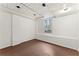 Unfinished basement area with painted ceiling, floors, and walls at 370 Burton Dr, Douglasville, GA 30134