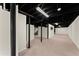 Expansive basement offers ample space, painted ceilings, and potential for customization at 1421 Downs Sw Dr, Atlanta, GA 30311