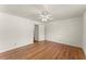 Large bedroom with hardwood floors and multiple closets at 1421 Downs Sw Dr, Atlanta, GA 30311