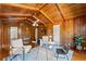 Inviting office space with wooden walls and ceilings, plenty of natural light, and a dedicated desk area at 1421 Downs Sw Dr, Atlanta, GA 30311