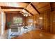 Stylish office with wood paneled walls, vaulted ceilings, and sun-filled window at 1421 Downs Sw Dr, Atlanta, GA 30311