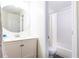 Clean bathroom featuring a modern vanity and shower/tub combo at 4541 Wieuca Ne Rd, Atlanta, GA 30342
