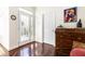 Entryway with hardwood floors, a wooden dresser, and a white door at 4541 Wieuca Ne Rd, Atlanta, GA 30342