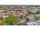 Aerial view of townhomes surrounded by mature trees and convenient street access at 1199 Huff Nw Rd # 112, Atlanta, GA 30318