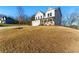 Landscaped lawn of this home shows a classic architectural design with inviting front porch at 20 Running Nw Ter, Cartersville, GA 30121