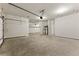 Spacious garage with ample storage and organization options, including overhead racks and water heaters at 20 Running Nw Ter, Cartersville, GA 30121