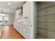 Kitchen features modern white cabinets, stainless steel appliances, and a convenient pantry at 20 Running Nw Ter, Cartersville, GA 30121
