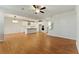Open-concept living area showcasing the modern kitchen and hardwood floors at 20 Running Nw Ter, Cartersville, GA 30121