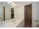 Bathroom featuring a vanity and access to the bedroom at 305 Collegiate Dr, Powder Springs, GA 30127