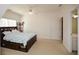 Bedroom featuring a ceiling fan, carpeted floors and a bed with a bookshelf headboard at 305 Collegiate Dr, Powder Springs, GA 30127