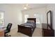 Bedroom with neutral carpet, ceiling fan, and furniture at 305 Collegiate Dr, Powder Springs, GA 30127