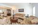 Comfortable living room with plush seating, elegant decor, and natural light at 305 Collegiate Dr, Powder Springs, GA 30127