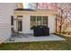 Back patio with grill at 305 Collegiate Dr, Powder Springs, GA 30127