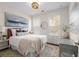 Bright bedroom features a large bed, natural light, and neutral decor at 4336 Walsh Dr, Dunwoody, GA 30338