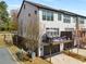 Three story exterior with large deck overlooking a paved parking area at 4336 Walsh Dr, Dunwoody, GA 30338