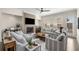 Spacious living room featuring a modern fireplace, plush seating, and large windows with natural light at 4336 Walsh Dr, Dunwoody, GA 30338