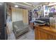 Cluttered basement with storage shelves and sewing machine at 4382 Conwhey Sw Ct, Smyrna, GA 30082