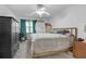 Bright bedroom with ceiling fan and wardrobe at 4382 Conwhey Sw Ct, Smyrna, GA 30082