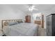 Bright bedroom with a ceiling fan and ensuite bathroom at 4382 Conwhey Sw Ct, Smyrna, GA 30082