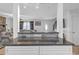 Eat-in kitchen counter with white cabinets and granite counters at 4382 Conwhey Sw Ct, Smyrna, GA 30082