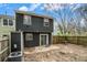 View of the back of the home with a sliding glass door, fence, and patio at 6962 Oakhill Cir, Austell, GA 30168