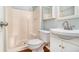 Bathroom with a shower, toilet and sink with vanity at 6962 Oakhill Cir, Austell, GA 30168
