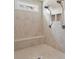 This bathroom features a beautiful tile shower, bench, dual shower heads and a window to bring in natural light at 2845 Echols Rd, Cumming, GA 30041
