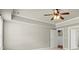Spacious bedroom featuring a ceiling fan, neutral paint, and white trim at 2845 Echols Rd, Cumming, GA 30041